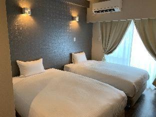 Mr. Kinjo In Nishizaki Aparthotel Itoman Room photo